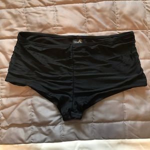 Slightly high waisted, ruffled swim bottoms